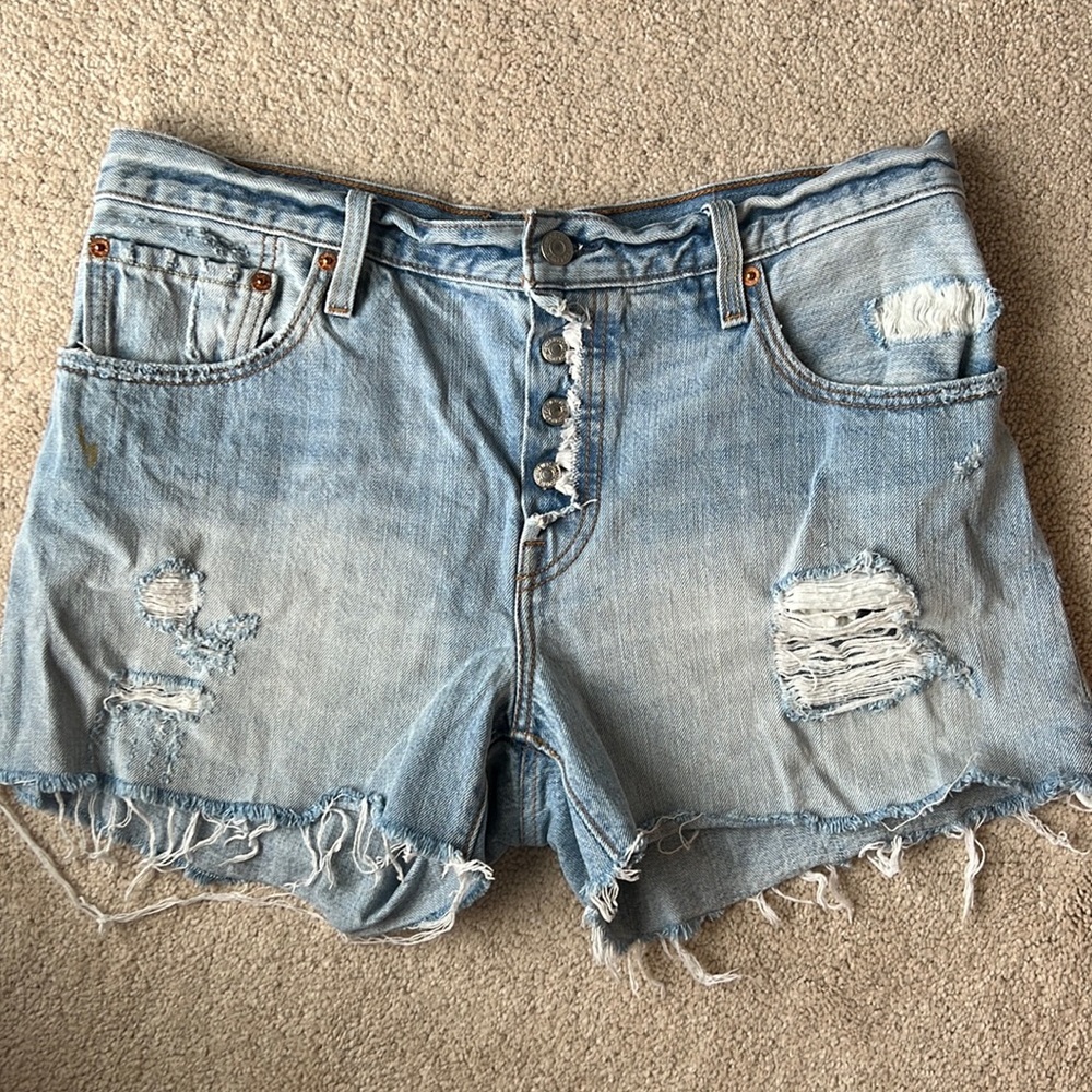Distressed Levi Jean shorts